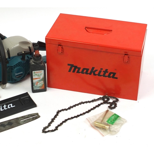 100 - Makita two stroke chainsaw, model DCS5121