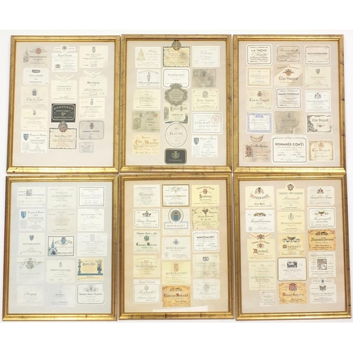 484 - Six framed displays of printed wine labels