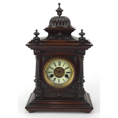 104 - American walnut cased mantel clock, 42cm high