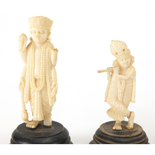 102 - Indian carved ivory figures and animals, some on ebonised wood bases including a finely carved eleph... 