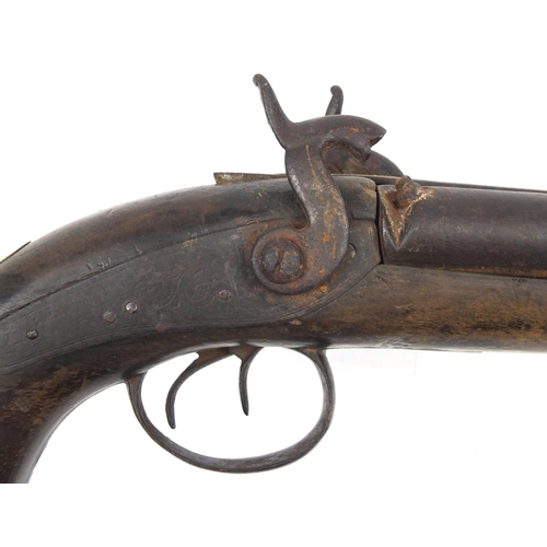 351 - Antique double-barrelled percussion pistol by Manton, 34cm in length