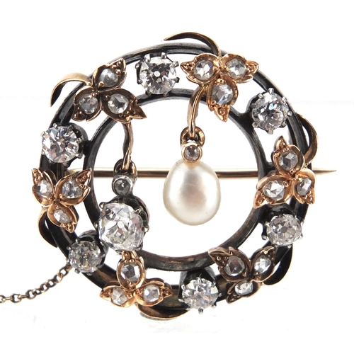 795 - Antique gold pin brooch set with old cut diamonds and a pearl, 2.7cm in diameter, approximate weight... 