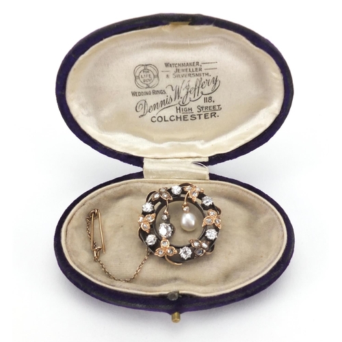 795 - Antique gold pin brooch set with old cut diamonds and a pearl, 2.7cm in diameter, approximate weight... 