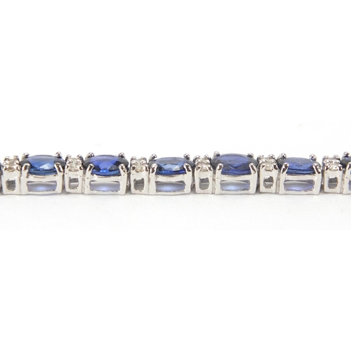 807 - 18ct white gold sapphire and diamond bracelet, 18cm in length, approximate weight 9.4g