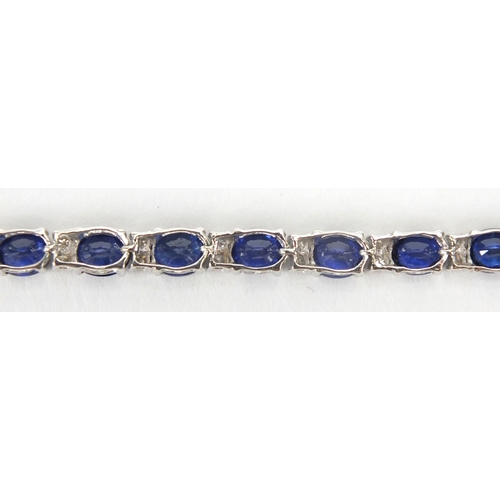 807 - 18ct white gold sapphire and diamond bracelet, 18cm in length, approximate weight 9.4g