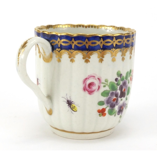 599 - 19th Century Royal Worcester fluted porcelain cup, the centre hand painted with a panel of a bridge ... 