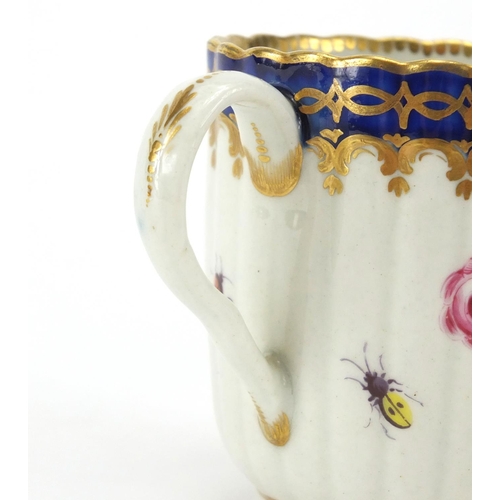 599 - 19th Century Royal Worcester fluted porcelain cup, the centre hand painted with a panel of a bridge ... 