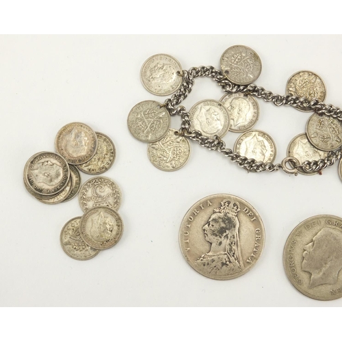 492 - Mostly British pre decimal coins including a Victorian 1890 half crown and a three penny bit bracele... 