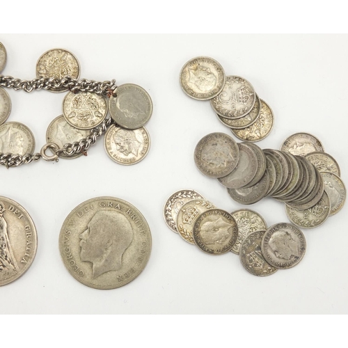 492 - Mostly British pre decimal coins including a Victorian 1890 half crown and a three penny bit bracele... 