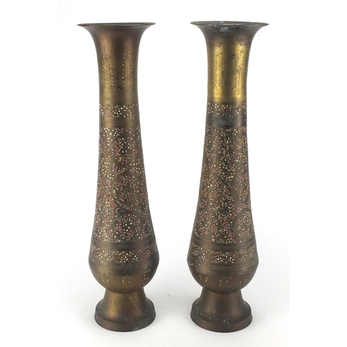 123 - Pair of Middle Eastern copper vases with hand painted decoration, 58cm high