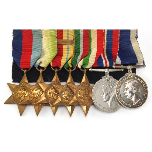 302 - British Military World War II medal group including Naval long service and good conduct medal awarde... 