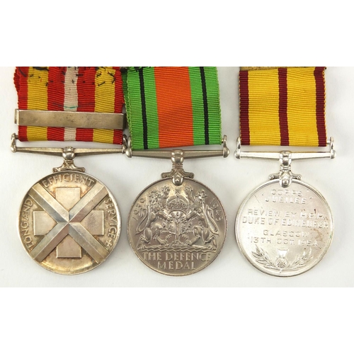 305 - British Military World War II defence medal, St Johns Ambulance Corps medal and Red Cross long and e... 