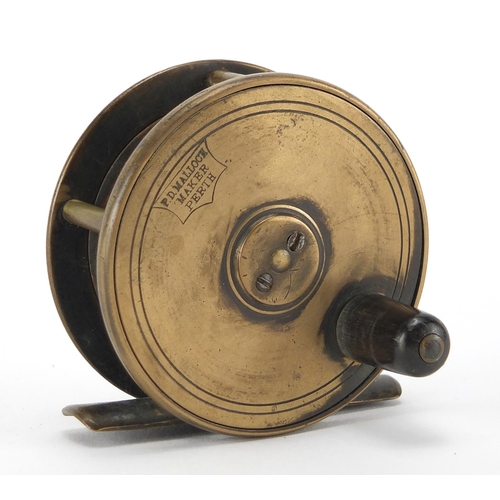 136 - Victorian brass fishing reel by P D Malloch maker of Perth, with leather case, 6.5cm in diameter