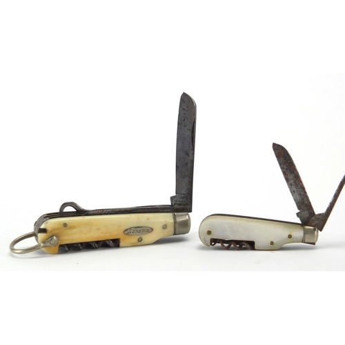 58 - Three 19th century folding multi pocket tools comprising silver, ivory and Mother of Pearl flanked e... 