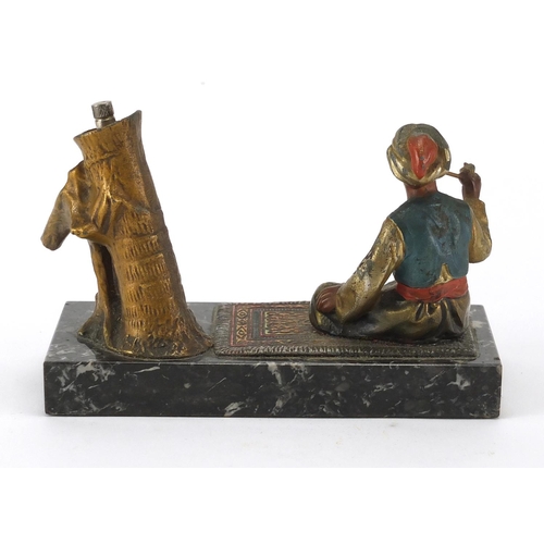 91 - Austrian cold painted carpet seller table lighter on rectangular marble base, 15.5cm wide