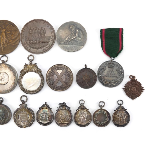 316 - Military interest sporting jewels and medallions, some silver including The Army Rifle Association, ... 