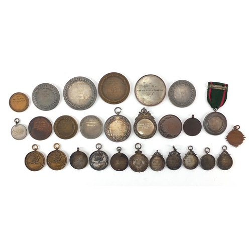 316 - Military interest sporting jewels and medallions, some silver including The Army Rifle Association, ... 