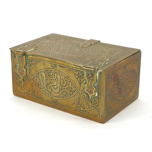 549 - Islamic brass box with hinged lid, engraved with script together with a similar dagger with sheath, ... 