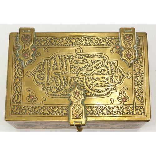 549 - Islamic brass box with hinged lid, engraved with script together with a similar dagger with sheath, ... 