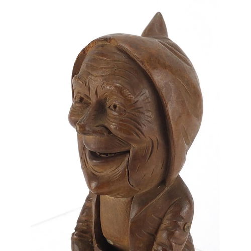 99 - Swiss black forest wooden nutcrackers, carved in the form of grandma, 25cm in length