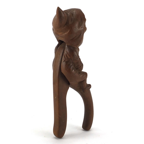 99 - Swiss black forest wooden nutcrackers, carved in the form of grandma, 25cm in length