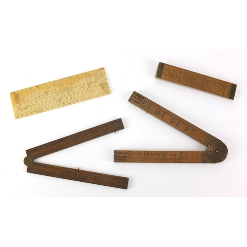 122 - Four antique and later rulers, three boxwood and one ivory including a Rabone with protractor and an... 