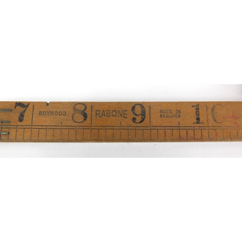 122 - Four antique and later rulers, three boxwood and one ivory including a Rabone with protractor and an... 