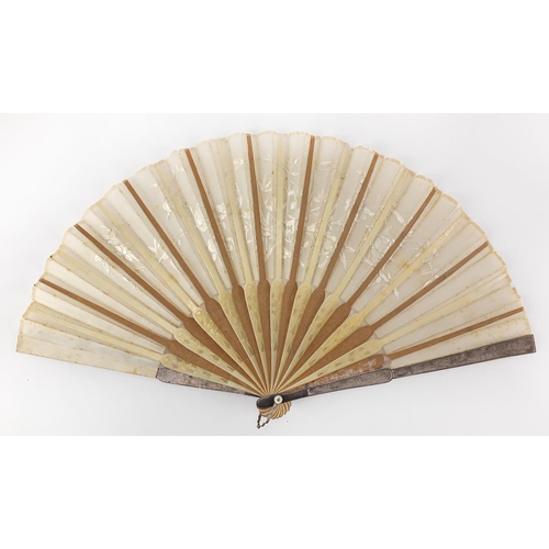 522 - Chinese silk fan with silver guards, ivory and sandalwood sticks carved with flowers, the silk fan e... 