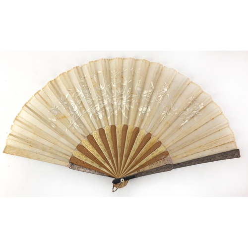 522 - Chinese silk fan with silver guards, ivory and sandalwood sticks carved with flowers, the silk fan e... 