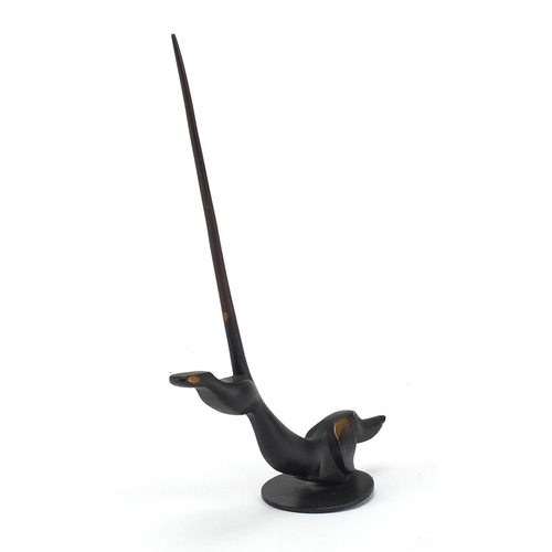 692 - Austrian stylised bronze Dachshund by Richard Rohac, factory marks to the base, 19.5cm high