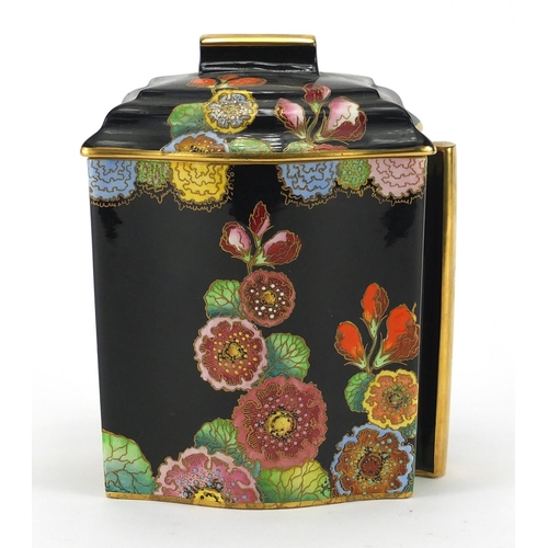 656 - Carlton Ware black hollyhock biscuit jar hand painted and gilded, factory marks to the base, 16cm hi... 