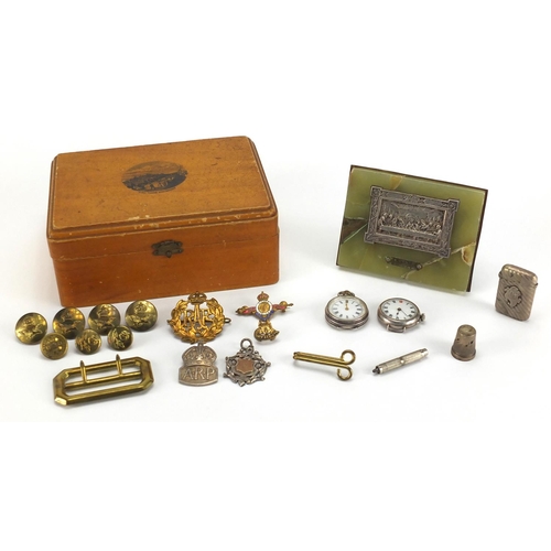 38 - Miscellaneous objects including silver fob watch, silver wristwatch, Military buttons and cap badges... 
