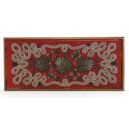 576 - Rectangular African beadwork panel, decorated with stylised flowers and foliage, 50cm x 21cm