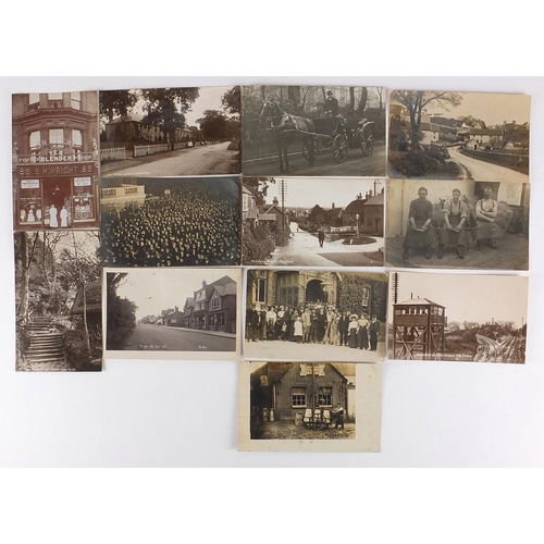 170 - Twelve black and white photographic postcards including Ascot High Street, horse drawn cart, Wivelsf... 
