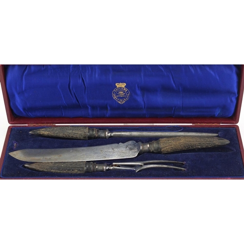 71 - Silver mounted three piece horn handle carving set, the silver mounts Sheffield 1914, housed in a fi... 