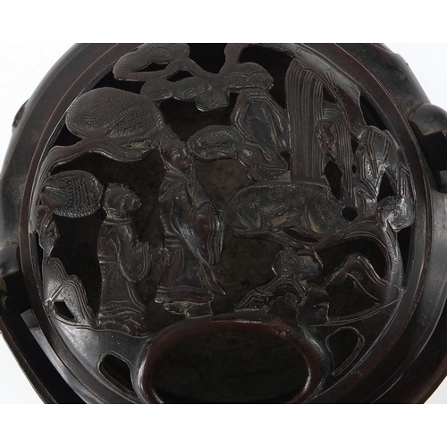 475 - Bronze incense burner and cover with swing handle, cast with figures on a boat, character marks to t... 