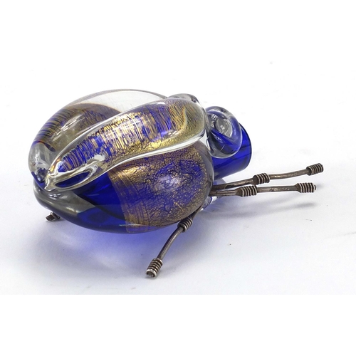 639 - Stylish art glass spider with gold flecked design etched marks to the base, 9cm in length