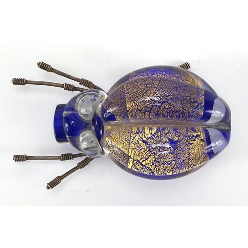 639 - Stylish art glass spider with gold flecked design etched marks to the base, 9cm in length