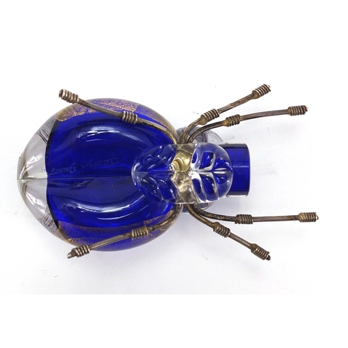 639 - Stylish art glass spider with gold flecked design etched marks to the base, 9cm in length