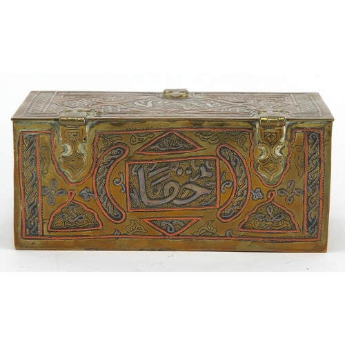 548 - Rectangular Egyptian Cairoware brass box with silver and copper inlay, decorated with script and sty... 