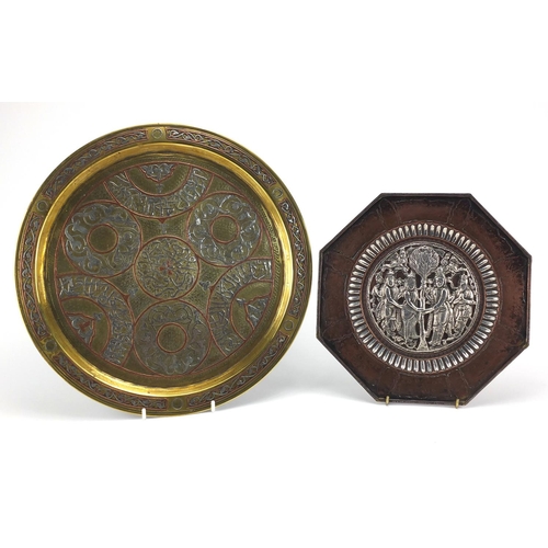 550 - Two Middle East plates, both with silver inlay including an Egyptian Cairoware tray decorated with s... 