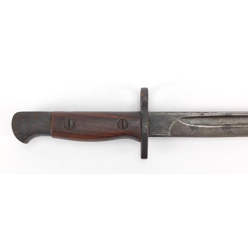 342 - British Military World War I bayonet and scabbard with wooden grip, impressed GR907, 57cm in length