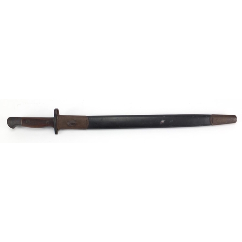 342 - British Military World War I bayonet and scabbard with wooden grip, impressed GR907, 57cm in length