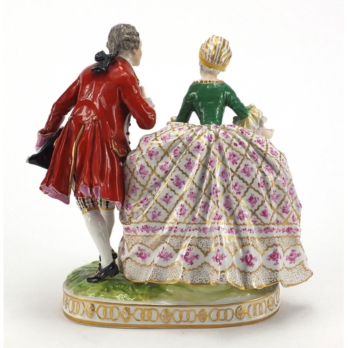 587 - Dresden hand painted porcelain figure group of a courting couple, factory marks to the base, 20cm hi... 