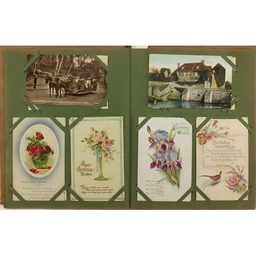 174 - Mostly Topographical and social history postcards and greetings cards arranged in an album, some pho... 