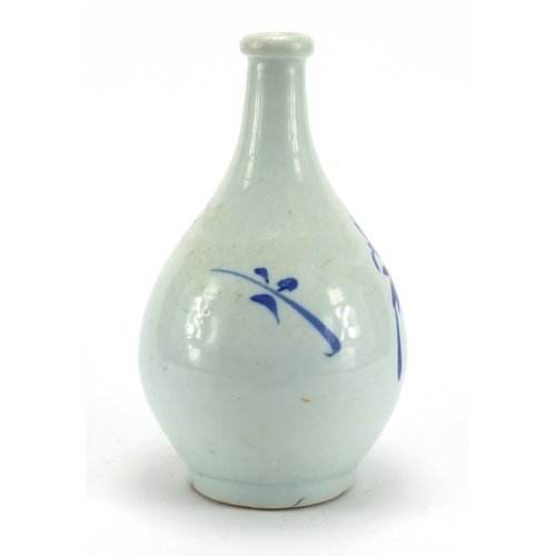448 - Chinese blue and white porcelain vase hand painted with a flower, 21cm high