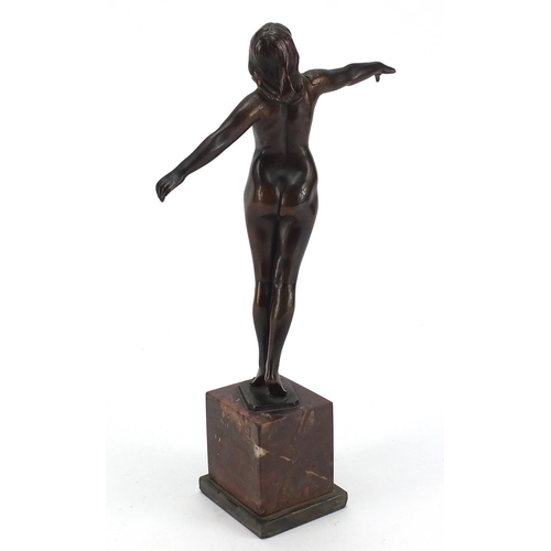 691 - Art Deco Patinated bronze study of a nude female with out stretched arms, indistinctly signed, raise... 