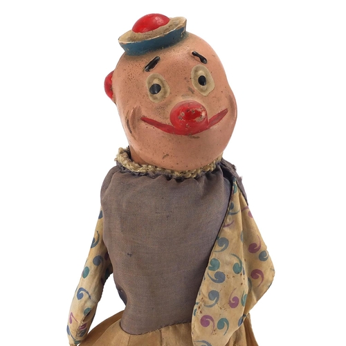 391 - Vintage hand painted clockwork clown, 26.5cm high