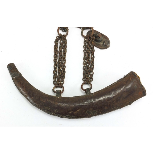 560 - Middle Eastern silver coloured metal sheath, engraved with stylised motifs, 19cm in length