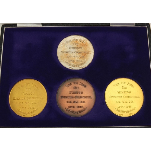 263 - Four Sir Winston Churchill commemorative medallions comprising one in 22ct gold, one silver gilt, on... 